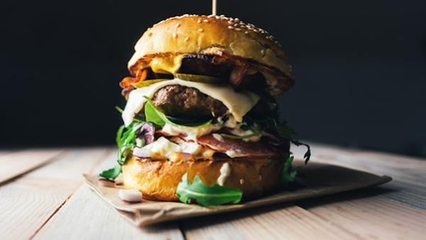 beef burger with cheese and bacon toppings
